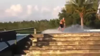 Wakeboard trick on a waterfall and comes up with an alligator